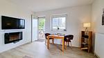 Wohnzimmer - Ferienwohnung "Baltic Sunset" in 1. Reihe zum Ostseestrand - Top-Hundeurlaub