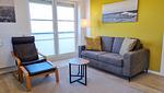 Wohnzimmer - Ferienwohnung "Baltic Sunset" in 1. Reihe zum Ostseestrand - Top-Hundeurlaub