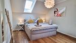 Schlafzimmer - Ferienhaus "Küstenhuus" in Kalifornien an der Ostsee - Top-Hundeurlaub