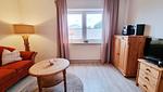 Wohnzimmer - Ferienwohnung "Achtern Diek 2" 1. Reihe an der Ostseeküste - Top-Hundeurlaub