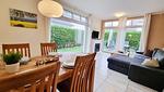 Wohnzimmer - Ferienwohnung "Baltic Sunrise" mit Garten an der Ostseeküste - Top-Hundeurlaub