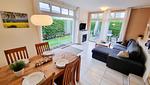 Wohnzimmer - Ferienwohnung "Baltic Sunrise" mit Garten an der Ostseeküste - Top-Hundeurlaub