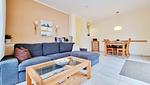 Wohnzimmer - Ferienwohnung "Baltic Sunrise" mit Garten an der Ostseeküste - Top-Hundeurlaub