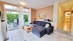 Wohnzimmer - Ferienwohnung "Baltic Sunrise" mit Garten an der Ostseeküste - Top-Hundeurlaub