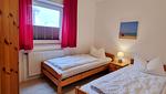 Schlafzimmer - Ferienwohnung "Achtern Diek 1" 1. Reihe an der Ostseeküste - Top-Hundeurlaub