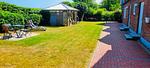 Garten - Ferienwohnung "Achtern Diek 1" 1. Reihe an der Ostseeküste - Top-Hundeurlaub