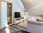Wohnzimmer mit TV - Wohnung 19 - Top-Hundeurlaub