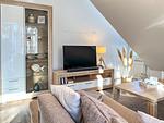 Wohnzimmer mit Blick zum TV - Wohnung 19 - Top-Hundeurlaub