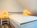1. Schlafzimmer mit Doppelbett - Wohnung 19 - Top-Hundeurlaub