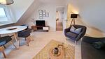 Wohnzimmer - Ferienwohnung "Achtern Diek 3" 1. Reihe an der Ostseeküste - Top-Hundeurlaub