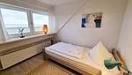 Schlafzimmer - Ferienwohnung "Achtern Diek 3" 1. Reihe an der Ostseeküste - Top-Hundeurlaub