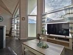 Wohnzimmer - Ferienhaus "Lönneberga" im Ferienpark Holm an der Ostsee - Top-Hundeurlaub