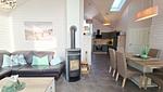 Wohnzimmer - Ferienhaus "Lönneberga" im Ferienpark Holm an der Ostsee - Top-Hundeurlaub
