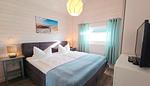 Schlafzimmer - Ferienhaus "Lönneberga" im Ferienpark Holm an der Ostsee - Top-Hundeurlaub