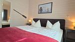 Schlafzimmer - Ferienhaus "Lönneberga" im Ferienpark Holm an der Ostsee - Top-Hundeurlaub