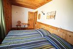 Schlafzimmer - Residenza Lagrev - 2 Zimmerwohnung Nr. 022 - Typ 21A - Hochparterre - Süd/West - Top-Hundeurlaub