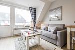 Wohnzimmer - Haus Norderstrasse 61, Whg. 8 - Top-Hundeurlaub
