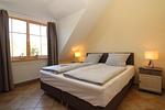 Schlafzimmer - Residenz Laguna Fewo 15 - Top-Hundeurlaub