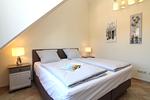 Schlafzimmer - Residenz Laguna Fewo 15 - Top-Hundeurlaub