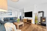 Wohnzimmer - Ferienhaus Kaptains Strandhuus Olpenitz - Top-Hundeurlaub