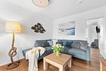 Wohnzimmer - Ferienhaus Kaptains Strandhuus Olpenitz - Top-Hundeurlaub