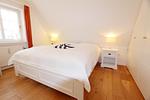 Schlafzimmer - Haus Meeresbrise - Westerstr. 26a, App. 4 - Top-Hundeurlaub