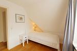 Schlafzimmer - Haus Meeresbrise - Westerstr. 26a, App. 4 - Top-Hundeurlaub