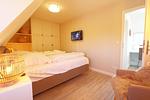 Schlafzimmer - COZY COTTAGE am Dorfteich - Bi Kiar 2a - Top-Hundeurlaub