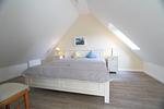 Schlafzimmer - Haus Albatros - Westerlandstr. 21 B - Top-Hundeurlaub