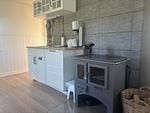 Kaminofen im Ferienhaus Hus Brobacka – gemütliches Schwedenhaus für Natururlaub - Hus Brobacka - Top-Hundeurlaub