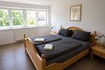 Schlafzimmer - Ferienhaus zum Kranichblick - für Familien + Hund - Top-Hundeurlaub