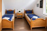 Schlafzimmer - Ferienhaus zum Kranichblick - für Familien + Hund - Top-Hundeurlaub