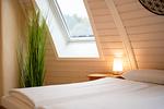 Ferienhaus Nordlichter - Kugelhaus am Tollensesee - Schlafzimmer mit angenehmem Ambiente - Nordlichter - Top-Hundeurlaub