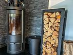 Kaminofen im Wohnzimmer des Ferienhauses Hus Thovid - Hus Thovid - Top-Hundeurlaub