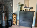 Wohnzimmer im Ferienhaus Hus Thovid mit Kaminofen - Hus Thovid - Top-Hundeurlaub