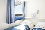 Schlafzimmer - FeWo FördePanorama - Top-Hundeurlaub