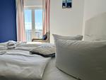 Schlafzimmer - Penthouse "Molenfeuer" mit umlaufender Terrasse und Meerblick - Top-Hundeurlaub