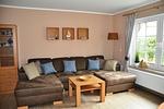 Wohnbereich mit Sofa - Am Deich Haus 24 - Top-Hundeurlaub