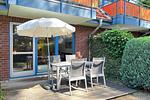 Terrasse mit Sonnenschirm - Wohnung 11-2 - Top-Hundeurlaub
