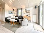 Wohnzimmer mit Blick zur Sofaecke - Ferienhaus 3 - Top-Hundeurlaub