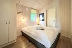 1. Schlafzimmer mit Doppelbett - Ferienhaus 3 - Top-Hundeurlaub