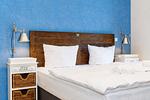 Schlafzimmer mit Doppelbett - Wohnung 01 - Top-Hundeurlaub