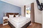 Schlafzimmer mit Doppelbett - Wohnung 03 - Top-Hundeurlaub