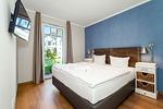 Schlafzimmer mit Doppelbett - Wohnung 13 - Top-Hundeurlaub