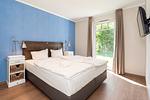 Schlafzimmer mit Doppelbett - Wohnung 08 - Top-Hundeurlaub