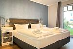 Schlafzimmer mit Doppelbett - Wohnung 10 - Top-Hundeurlaub