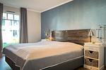 Schlafzimmer mit Doppelbett - Wohnung 09 - Top-Hundeurlaub