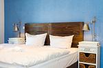 Schlafzimmer mit Doppelbett - Wohnung 09 - Top-Hundeurlaub