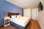 Schlafzimmer mit Doppelbett - Wohnung 09 - Top-Hundeurlaub