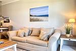 Wohnzimmer mit Sofa - Wohnung 39 - Top-Hundeurlaub